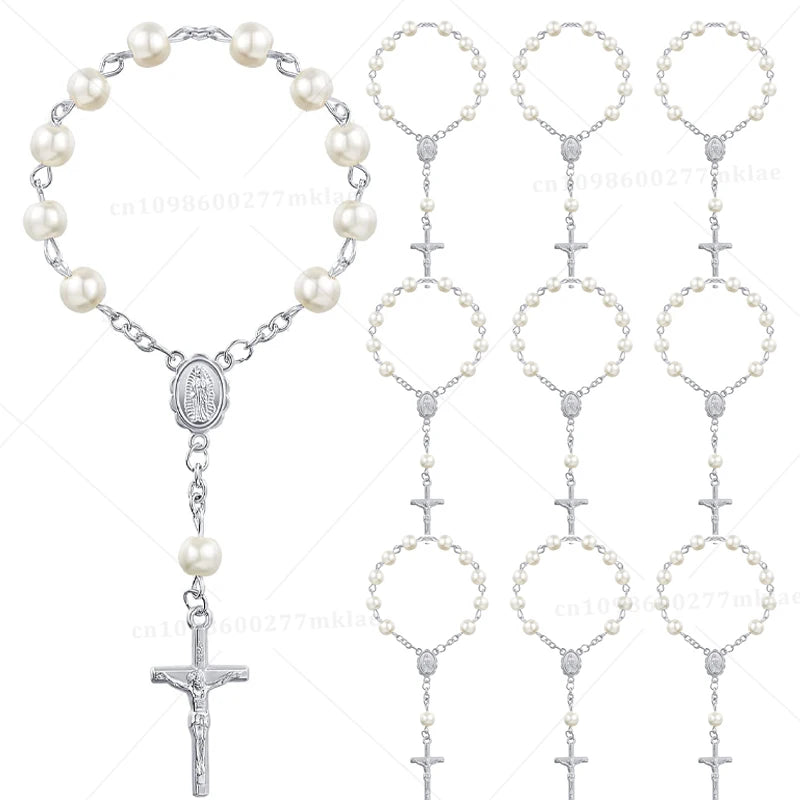 A set of mini baptism rosary favors with crosses in assorted styles and silver color.