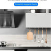 A set of heavy duty stainless steel magnetic hooks hanging on a kitchen cabinet, demonstrating a powerful magnetic hook.
