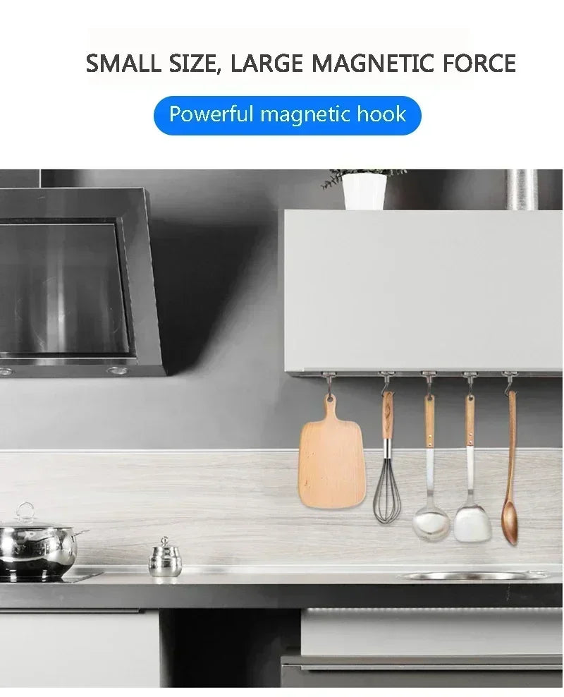 A set of heavy duty stainless steel magnetic hooks hanging on a kitchen cabinet, demonstrating a powerful magnetic hook.