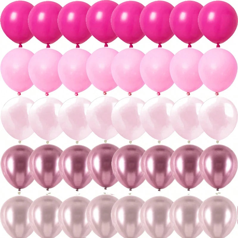 A pack of shimmering pink latex balloons in various shades, including bright pink and soft pink.