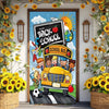 A colorful vinyl backdrop banner featuring a school bus and classroom elements for an event.