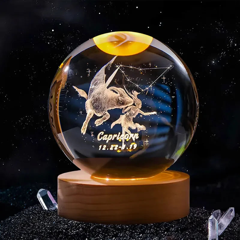 A spherical crystal ball with a laser engraved image of a leaping rabbit and the text Capricorn.