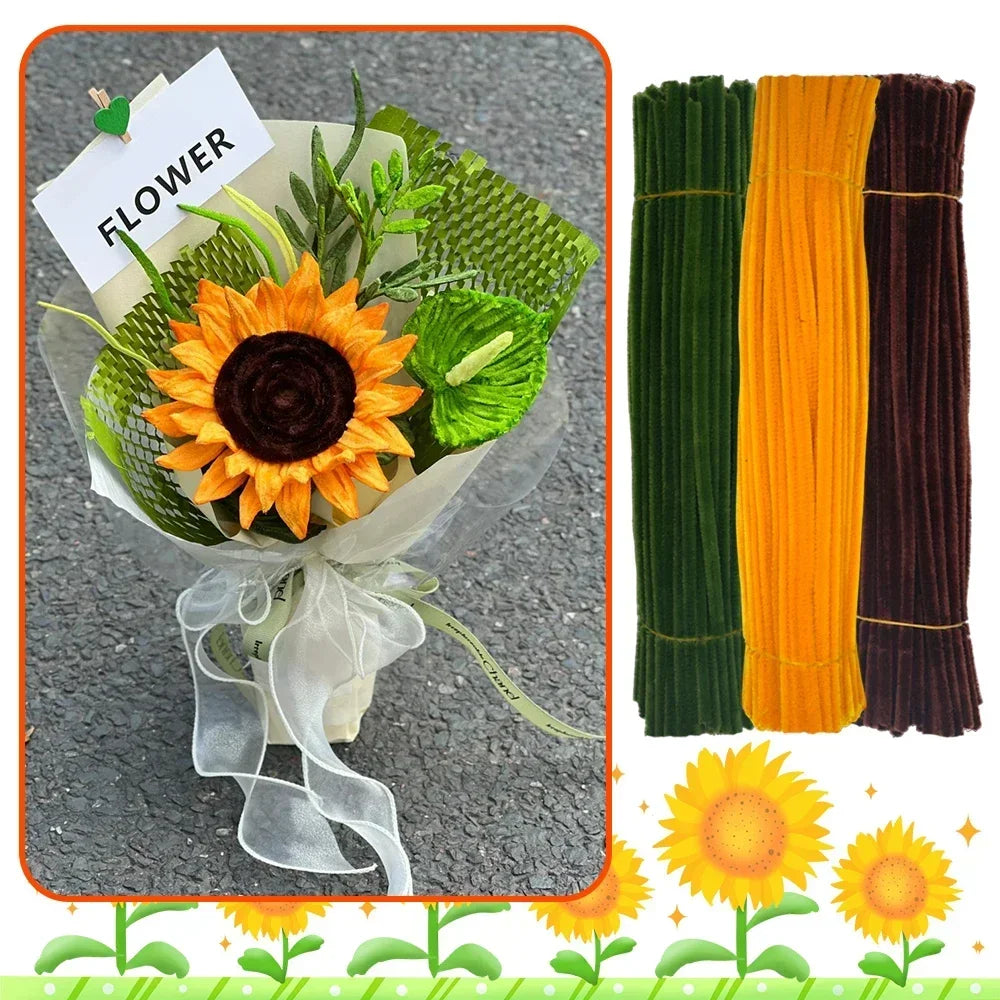 A bouquet of orange sunflowers wrapped in white paper and tied with a sheer ribbon