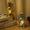 A pair of brass and silver LED lanterns with warm glow used as home and party décor.