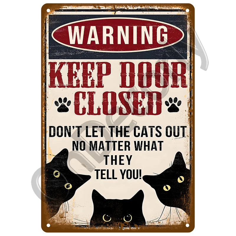 A vintage metal sign with a warning that reads Keep Door Closed and Don't Let the Cats Out.