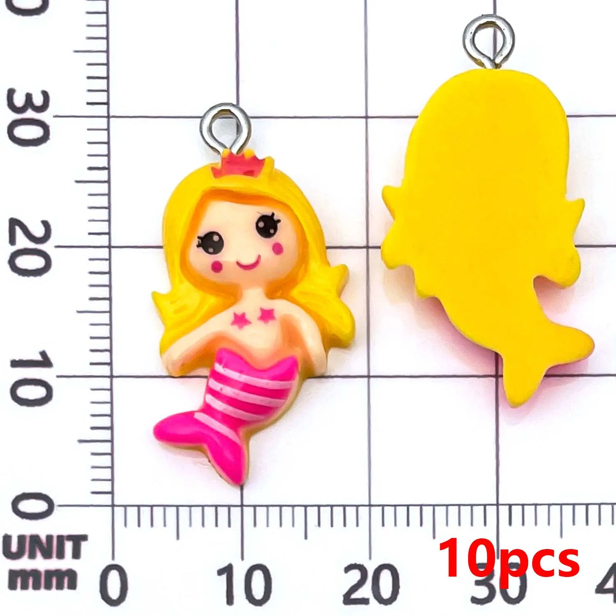 Yellow resin mermaid princess charm with pink striped tail and crown