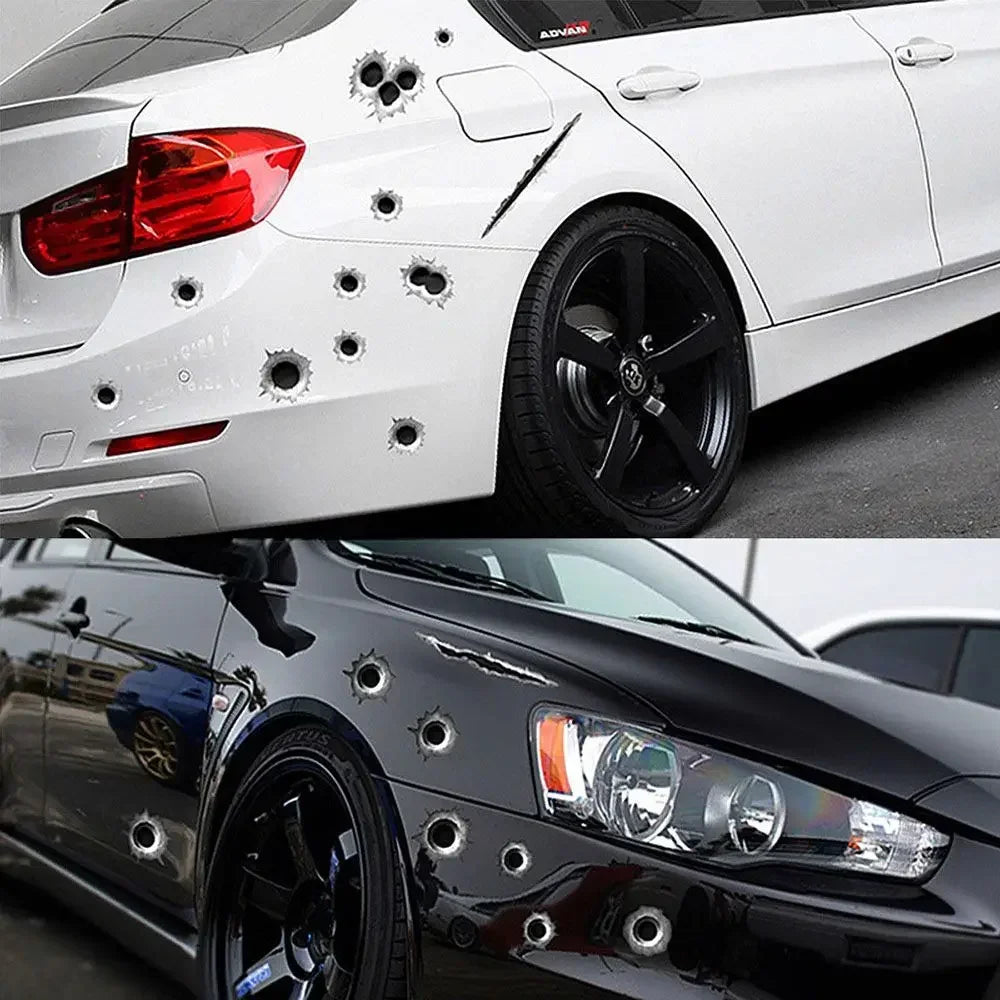 Close-up of a white car with bullet hole stickers on the side and a black car with similar decals on the headlight.
