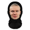 A realistic 3D printed horror balaclava mask worn by a person.