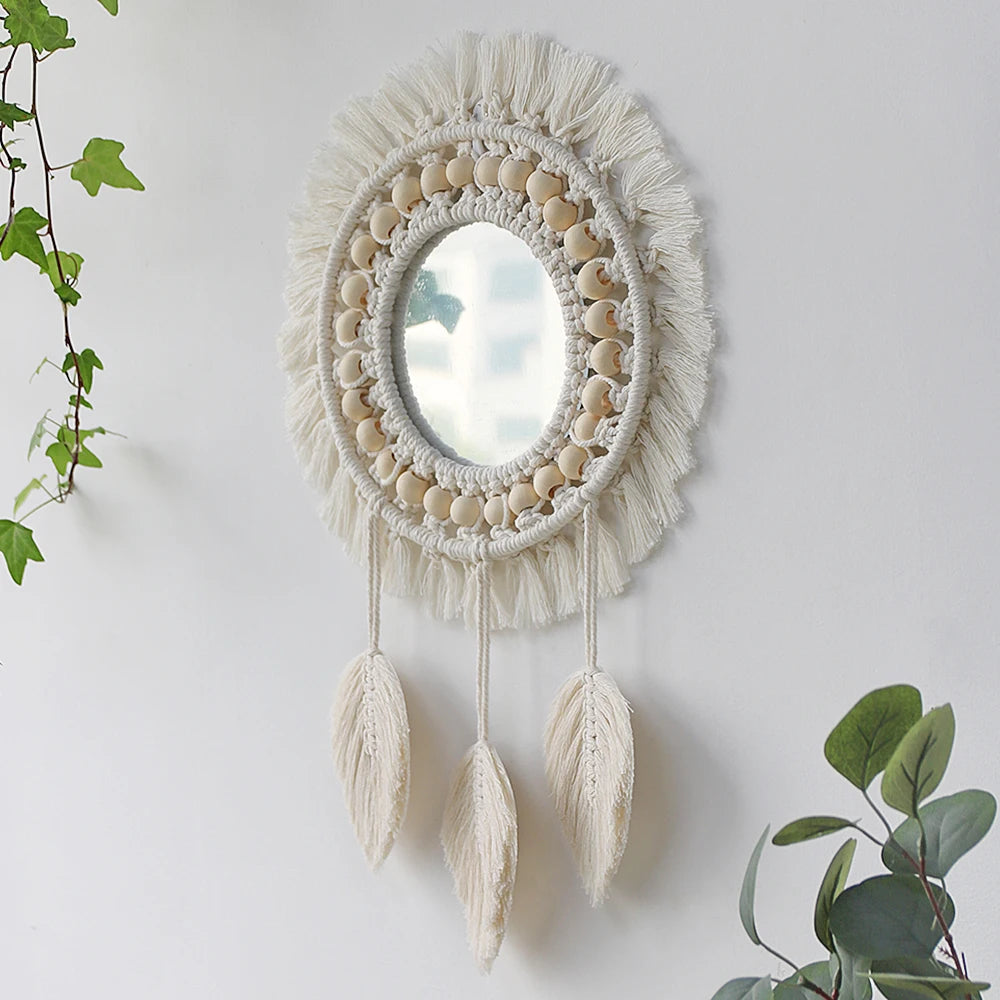 Miroir rond en macramé mural avec des fibres naturelles tressées et de la frange