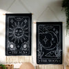 Black sun and moon boho wall tapestry featuring line art of the sun and moon