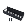 A black magnetic spice rack with two slotted compartments is shown from above.
