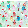 A collection of glow-in-the-dark Christmas duck figurines wearing Santa hats scattered on a clear surface.