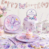 A purple and pink butterfly theme disposable party set featuring plates, cupcakes, and decorations.