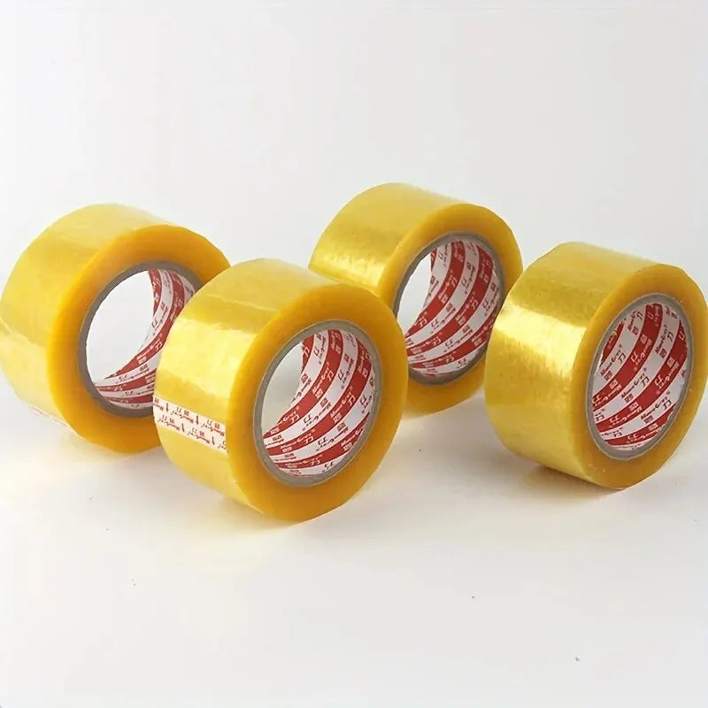 Several rolls of yellow heavy-duty transparent packing tape are displayed on a white background.