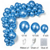 A collection of blue latex balloons, ribbon, chain, and glue for party decor.
