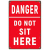A vintage red and white sign with the text DANGER DO NOT SIT HERE.