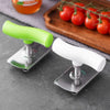 Stainless steel multi-function bottle cap opener with a lime green handle and white handle resting on a dark surface.