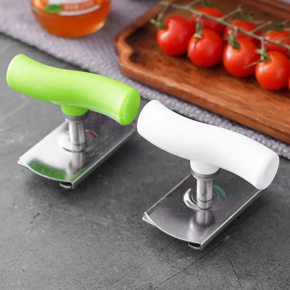 Stainless steel multi-function bottle cap opener with a lime green handle and white handle resting on a dark surface.