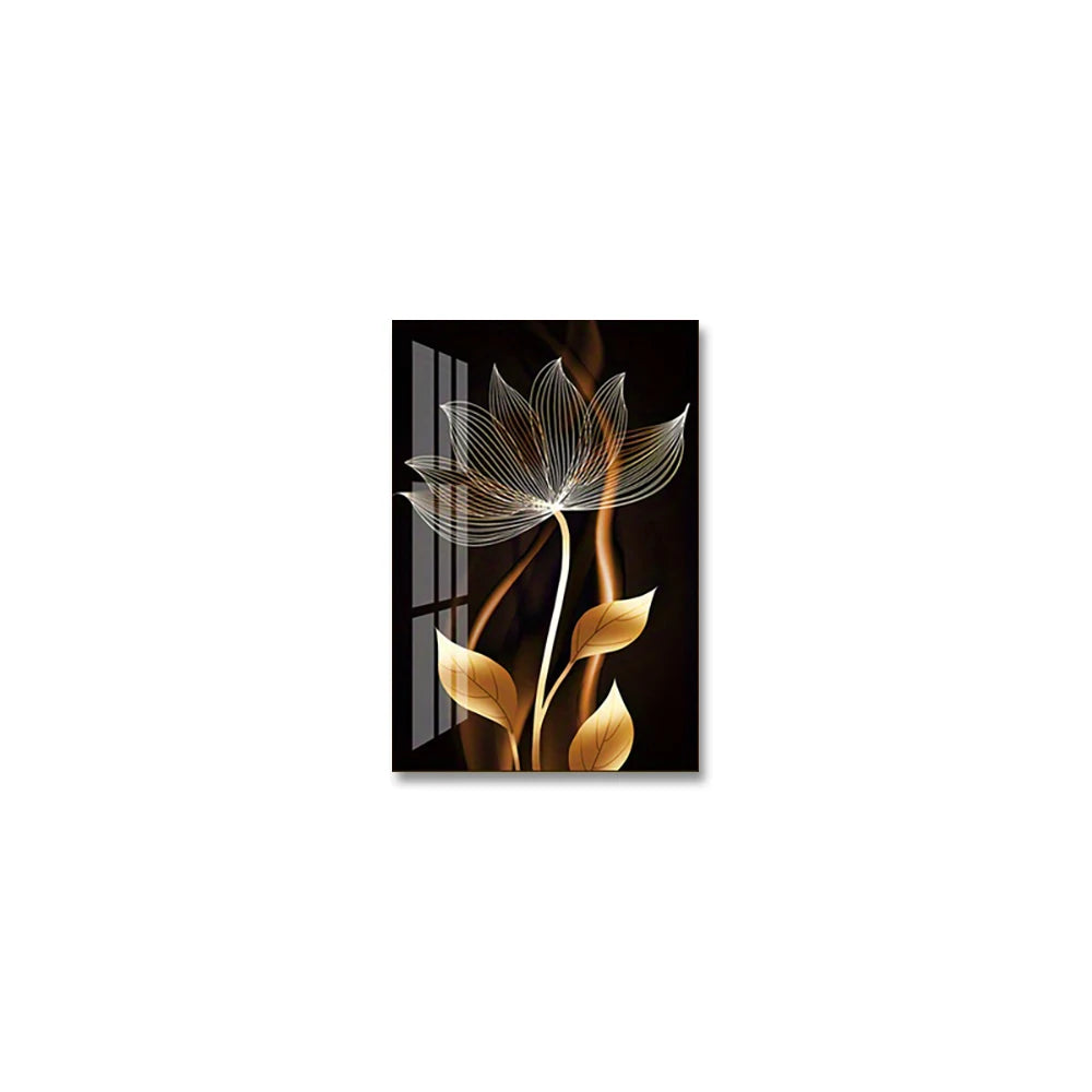 Abstract black and gold wall art featuring a delicate, stylized flower design.