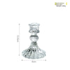 Elegant clear glass pillar candle holder with a decorative base and flared top