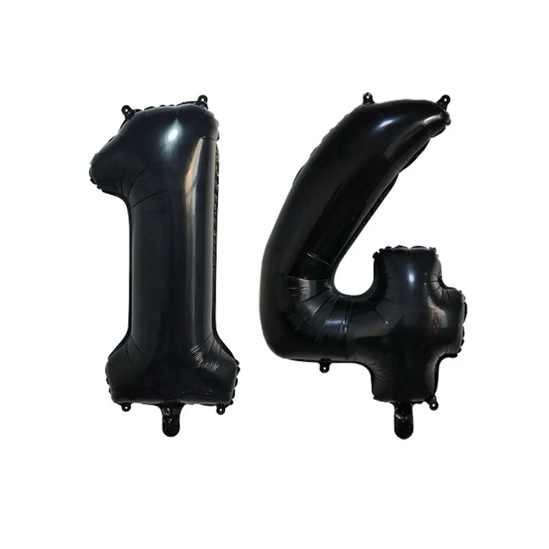 Black foil number balloon shaped like the number 4, used for birthday party decor.