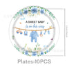 A plate decorated with a watercolor illustration of a baby theme featuring a wooden garland with baby items like a bottle and