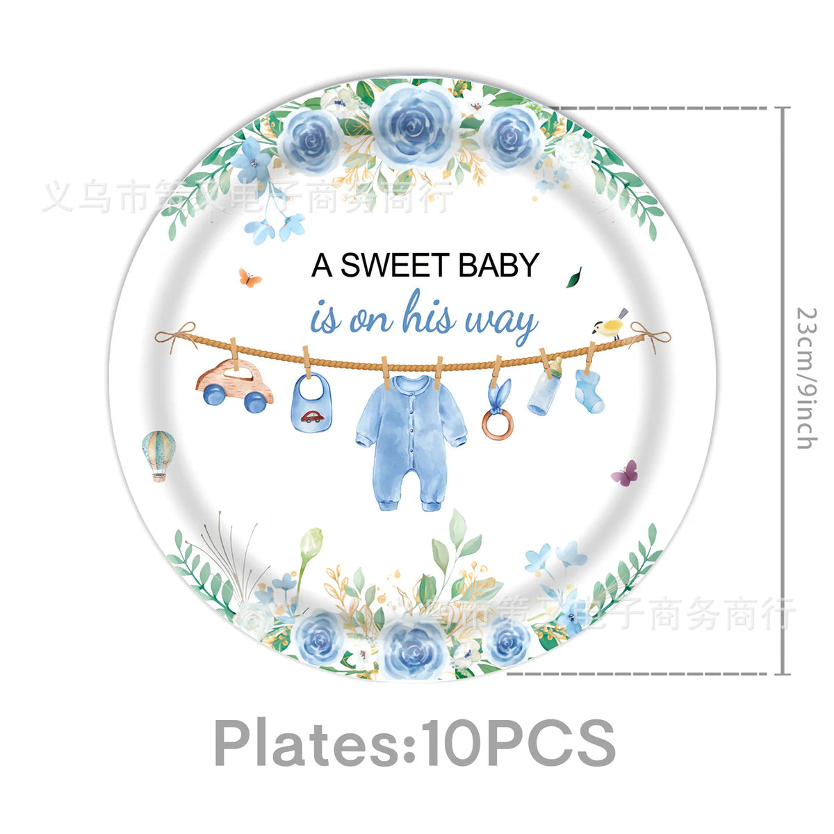 A plate decorated with a watercolor illustration of a baby theme featuring a wooden garland with baby items like a bottle and