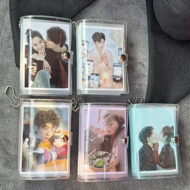 A set of five mini transparent photo albums for card storage featuring various portraits.