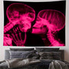 A pink X-ray image of two skulls embracing, displayed as a tapestry or wall art.