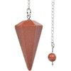 A natural rose quartz point pendant on a silver chain, used for divination and energy healing.