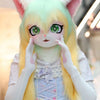 A cute, light green and yellow furry cosplay head with large eyes and pink ears, wearing a light blue dress.