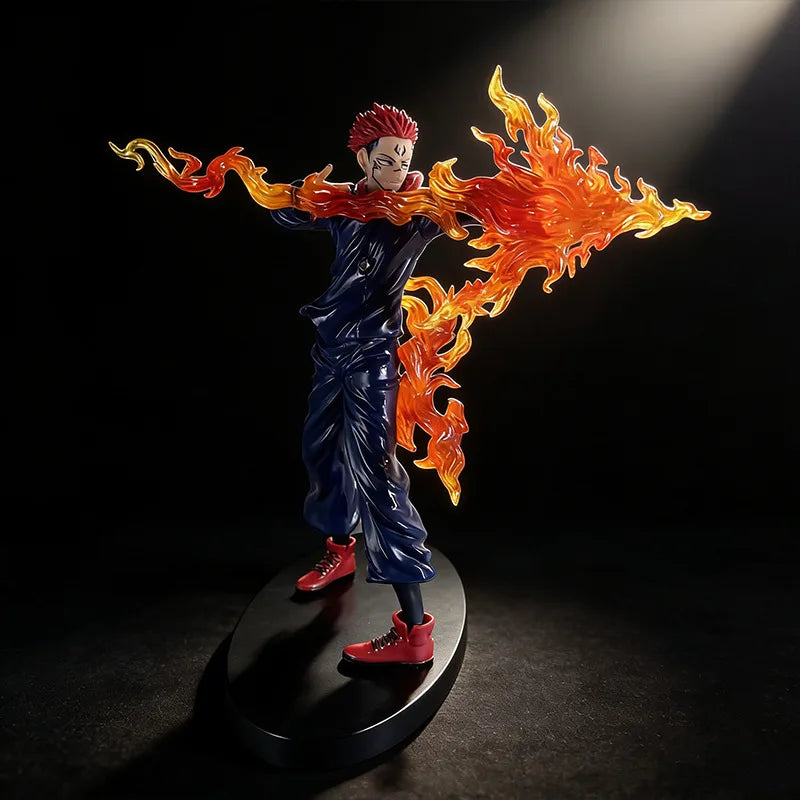 A figurine of a character with red hair engulfed in bright orange flames, displayed against a dark background.