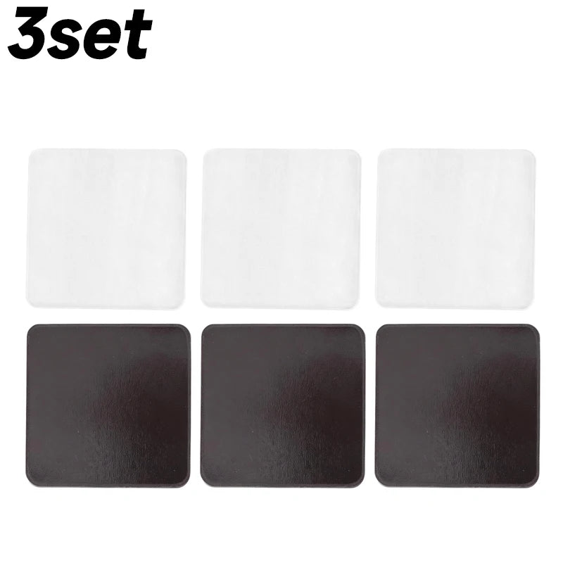A set of three square acrylic fridge magnets, two white and one dark brown.