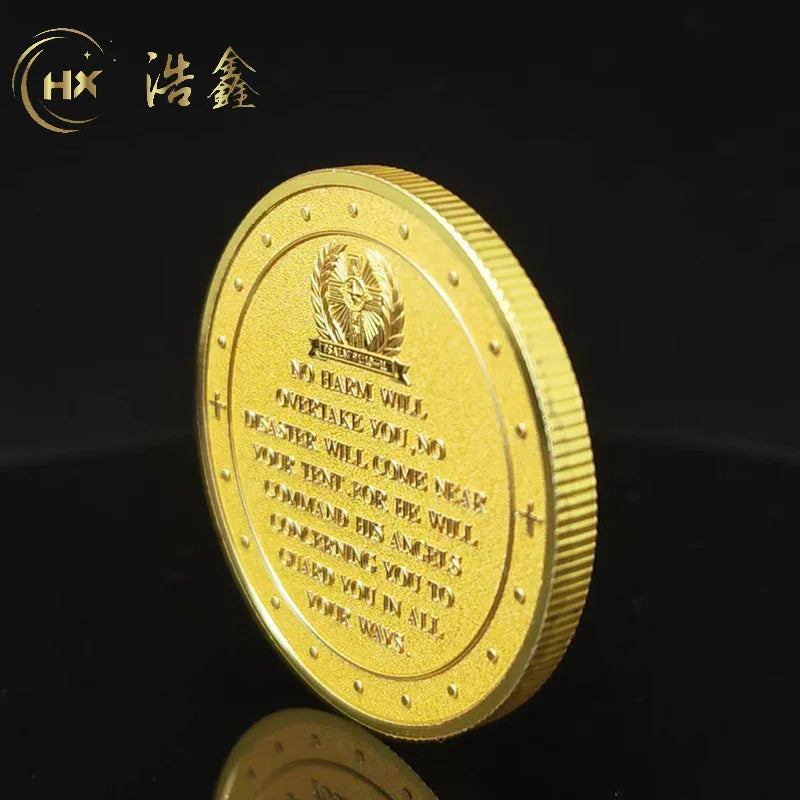 A gold medal coin featuring a winged warrior design and text on a dark background.