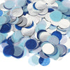 A pile of round tissue paper confetti dots in various shades of blue and silver.
