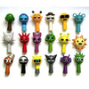 A collection of colorful, handcrafted musical figurines featuring various animal shapes and expressions.