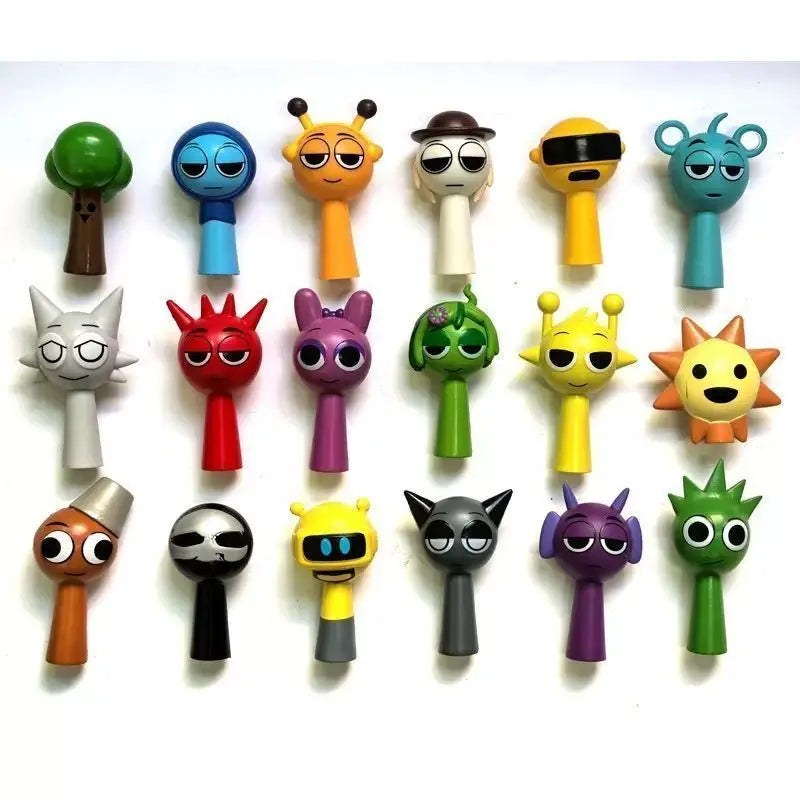 A collection of colorful, handcrafted musical figurines featuring various animal shapes and expressions.