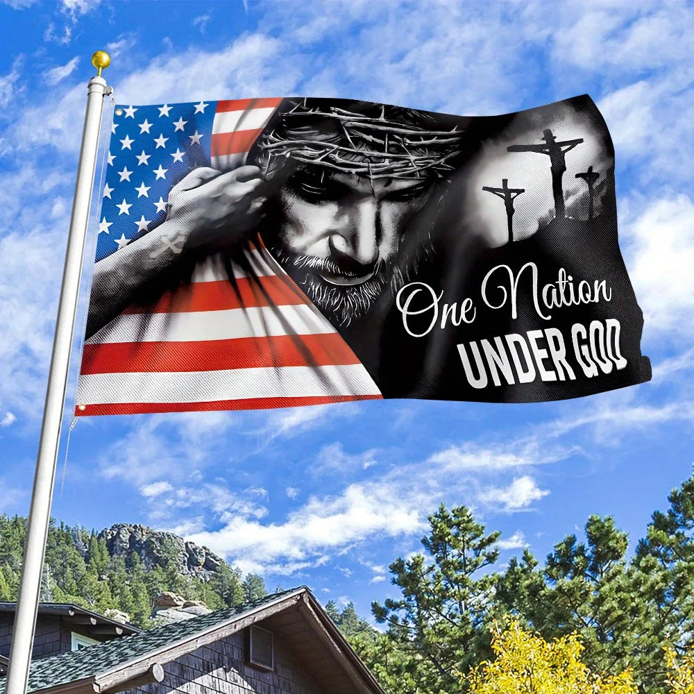 A black banner flag featuring a silhouette of Jesus and a depiction of the American flag with a cross.