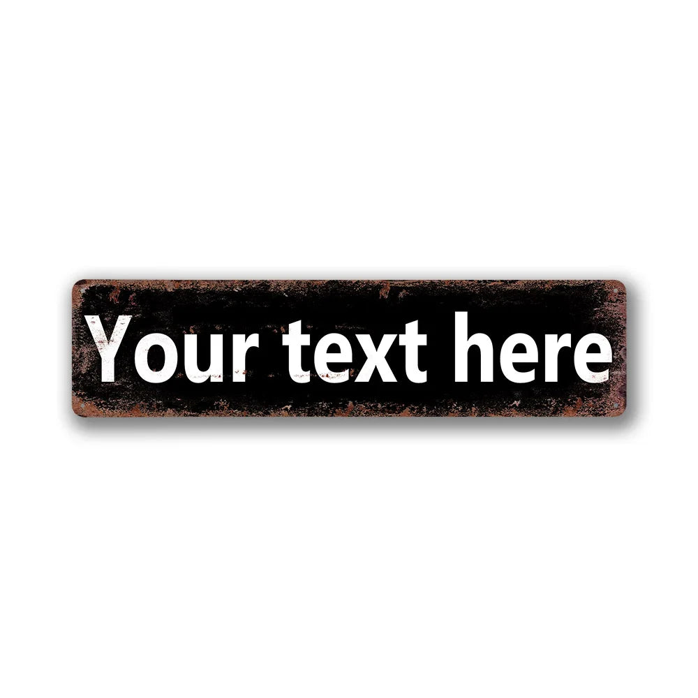 A rectangular, dark brown vintage tin sign with white text that reads Your text here.