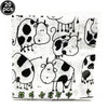 A sheet of cow print paper used for making number foil balloons for farm-themed parties.