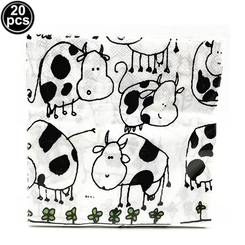 A sheet of cow print paper used for making number foil balloons for farm-themed parties.