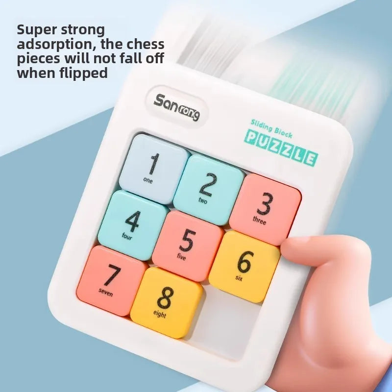 A hand holds a white magnetic sliding block puzzle with numbered pieces, demonstrating strong adhesion for educational play.