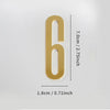 A polished gold house number six with a self-adhesive backing, measuring 7.0cm or 2.75 inches tall.