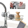 A faucet-mounted kitchen organizer with a drying rack and sponge holder is shown, featuring stainless steel and wooden elemen