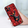 A red and black patterned Akatsuki anime soft TPU phone case is held in a hand.