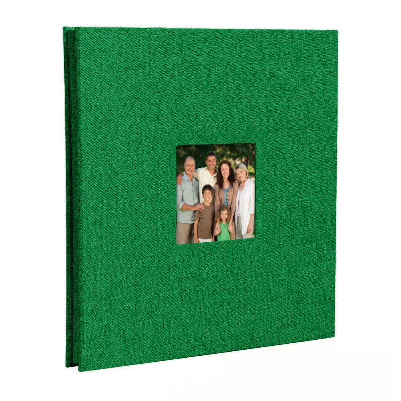 A green linen front scrapbook memory book with a photo of a family.