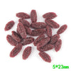 A pile of dark red, dried corn kernels or miniatures for crafting and décor.