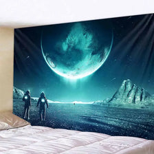 A dark space tapestry featuring a giant glowing blue planet, two figures standing on icy terrain, and jagged mountains.