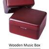 A small, dark red wooden music box with a lid, featuring laser engraving and beautifully packaged.