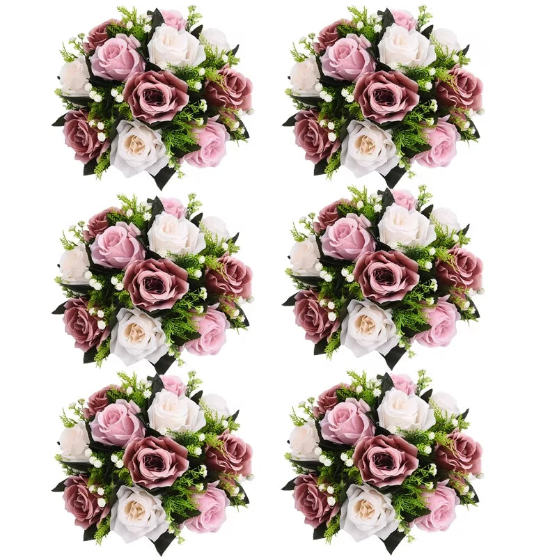 A set of six rose ball centerpieces featuring pink, mauve, and white silk artificial flowers with green foliage.